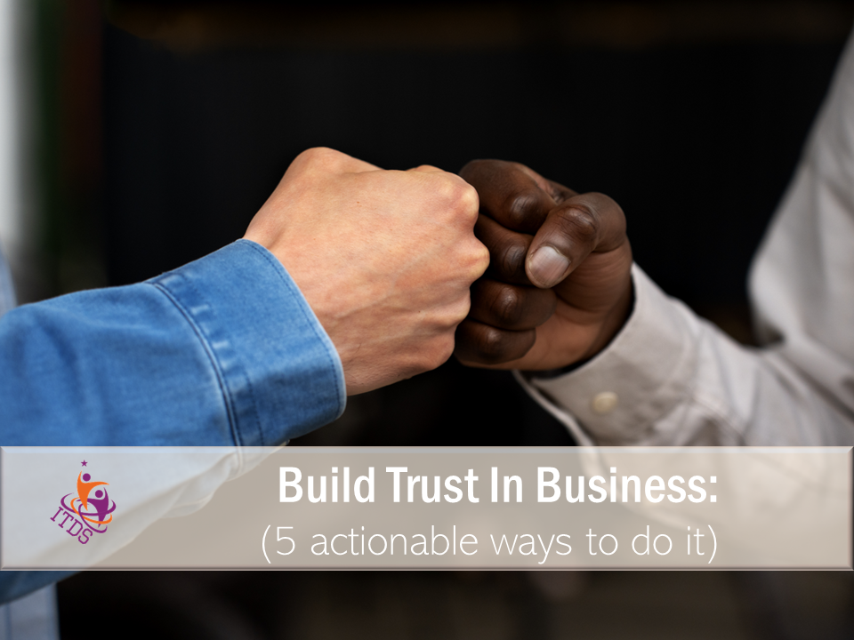 2 men fist bumping in celebrating trust in business