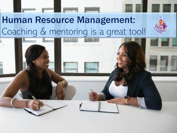 image of employee being coached by human resource manager