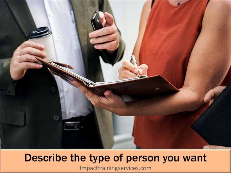 Small business owner double checking that she has properly describe the person she wants to hire