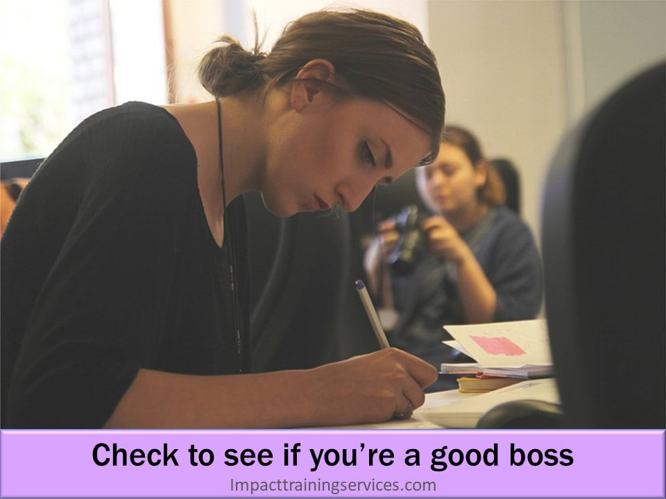 Female small business owner, checking to see if she's a good boss as part of hiring right