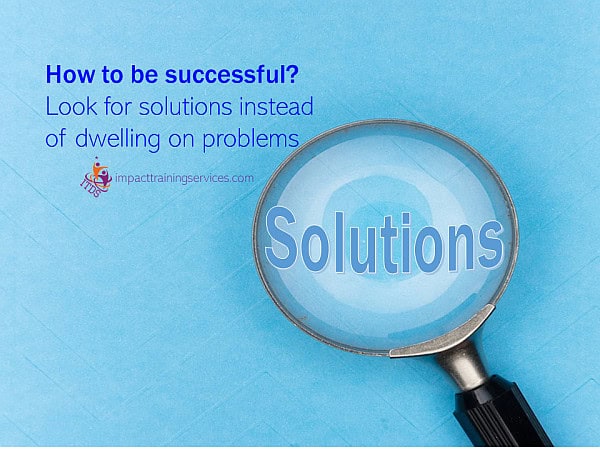 image of magnifying glass highlighting solutions showing how to be successful
