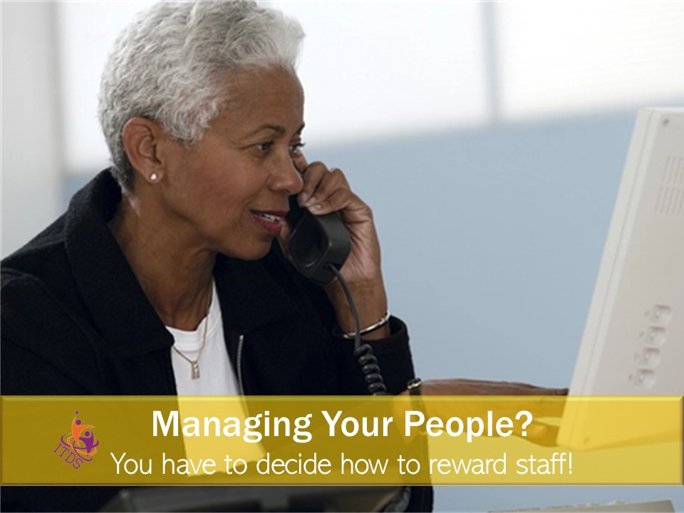 manager in deep concentration trying to decide how to reward staff