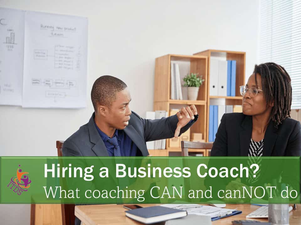 Man trying to convince a female CEO what a business coach can and cannot do