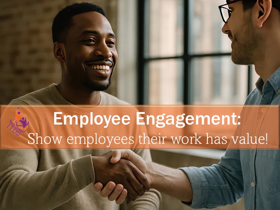 Employer shaking hands of employee in showing that he values his work