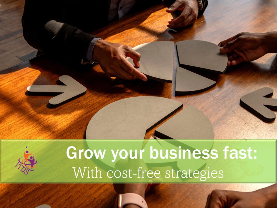 Image of group fitting shapes together symbolising growing a business