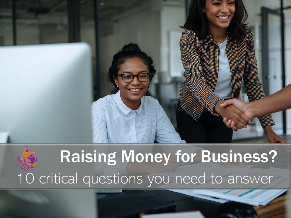 Two smiling women who have been successful at raising money for business