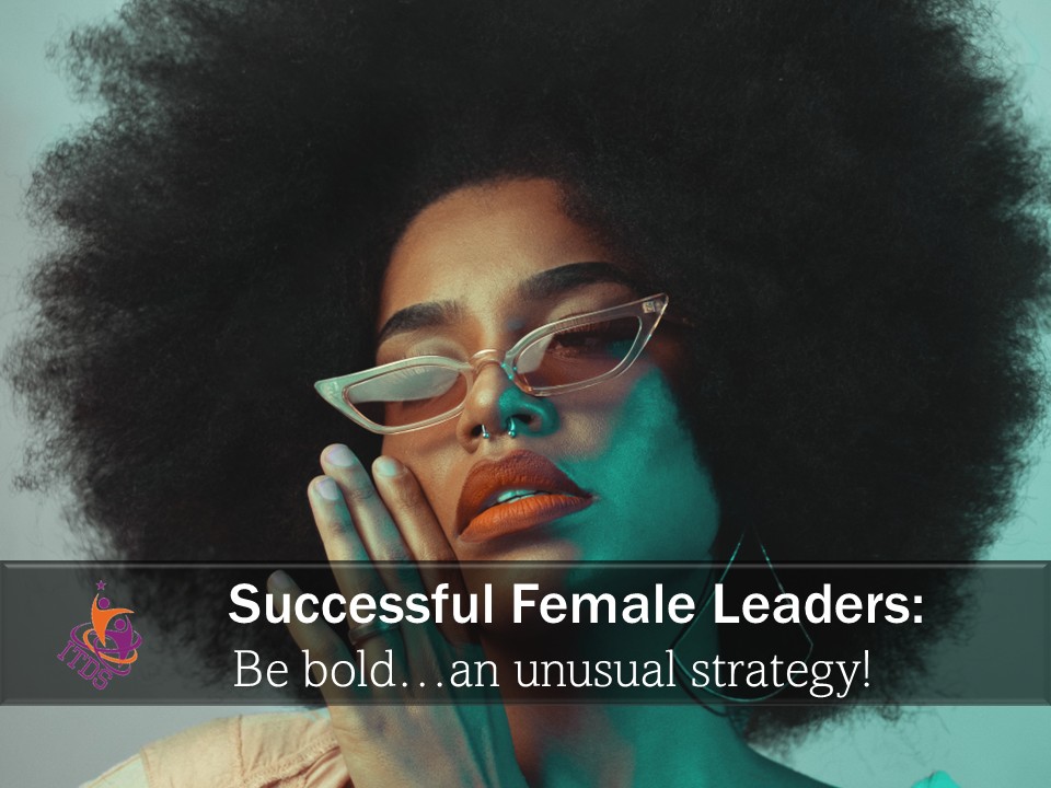 African-american female with a bold hairstyle, makeup and attitude representing a bold, successful female leader