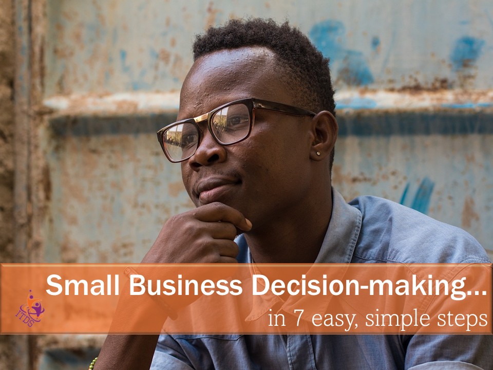 Man in pensive mood as he engages in small business decision-making